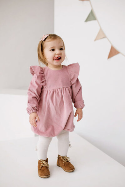 Corduroy romper with ruffles - Pink
